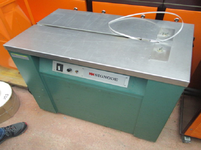 BANDEROLIERMASCHINE SIGNODE MS 220/50 - Упаковочное оборудование: фото 1 BANDEROLIERMASCHINE SIGNODE MS 220/50 - Упаковочное оборудование: фото 1