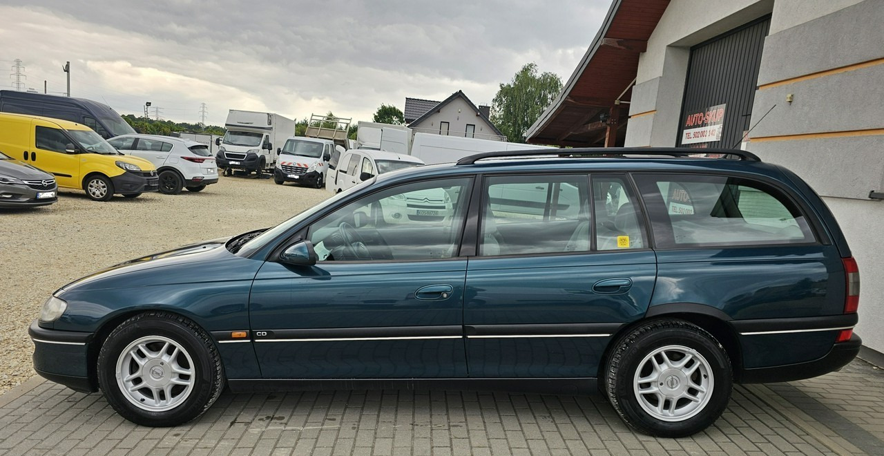 Opel Omega B 2,5 v6 *automat* napęd tył *welury* - Легковой автомобиль: фото 4 Opel Omega B 2,5 v6 *automat* napęd tył *welury* - Легковой автомобиль: фото 4