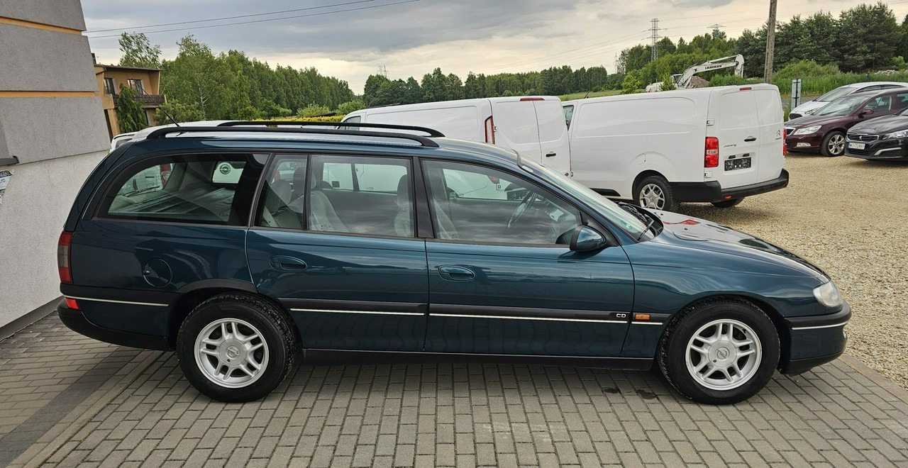 Opel Omega B 2,5 v6 *automat* napęd tył *welury* - Легковой автомобиль: фото 5 Opel Omega B 2,5 v6 *automat* napęd tył *welury* - Легковой автомобиль: фото 5