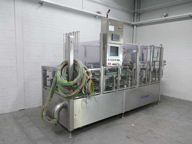 Grunwald filling- & closing machine Foodliner 12000/8 - Пищевое оборудование: фото 1 Grunwald filling- & closing machine Foodliner 12000/8 - Пищевое оборудование: фото 1