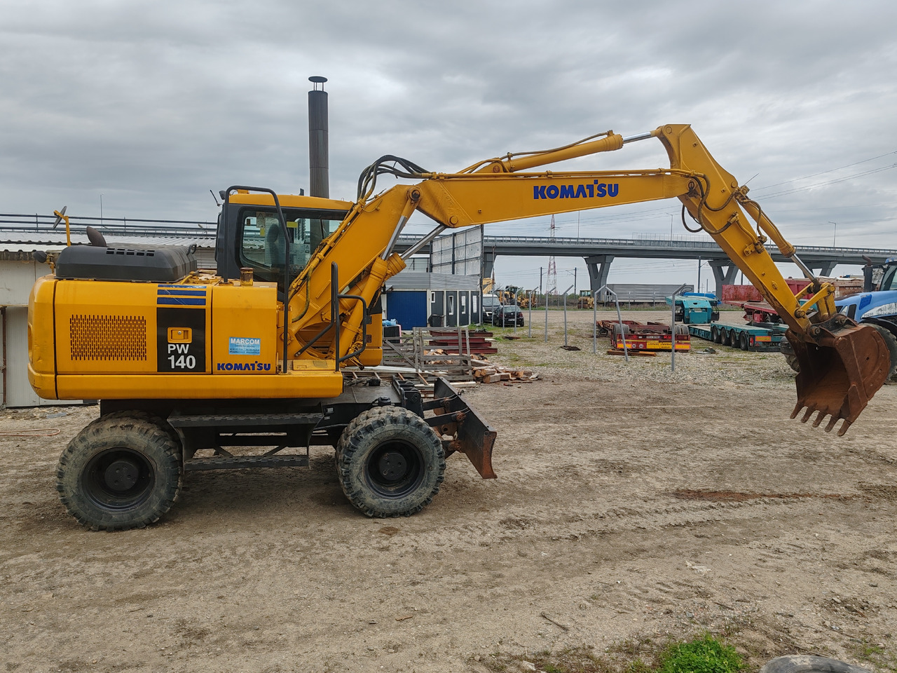 Komatsu PW140-7 - Колёсный экскаватор: фото 4 Komatsu PW140-7 - Колёсный экскаватор: фото 4