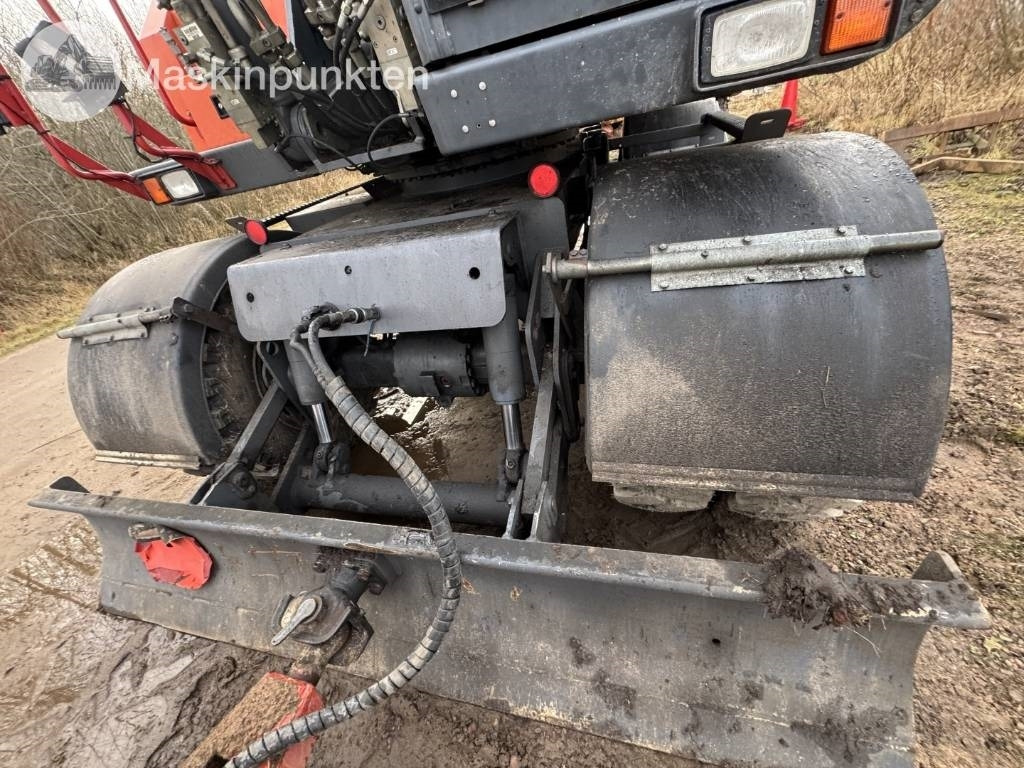 Doosan DX 140 W-3 - Колёсный экскаватор: фото 5 Doosan DX 140 W-3 - Колёсный экскаватор: фото 5