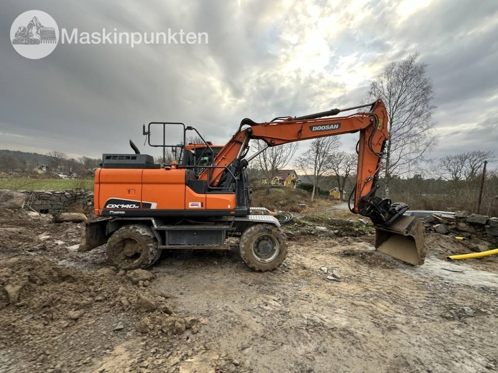 Doosan DX 140 W - Колёсный экскаватор: фото 4 Doosan DX 140 W - Колёсный экскаватор: фото 4