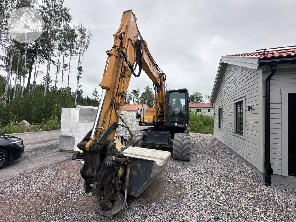 Hyundai Robex 140 W-7 A - Колёсный экскаватор: фото 2 Hyundai Robex 140 W-7 A - Колёсный экскаватор: фото 2