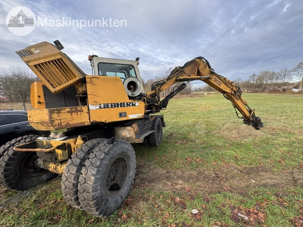 Liebherr A 310 B - Колёсный экскаватор: фото 3 Liebherr A 310 B - Колёсный экскаватор: фото 3