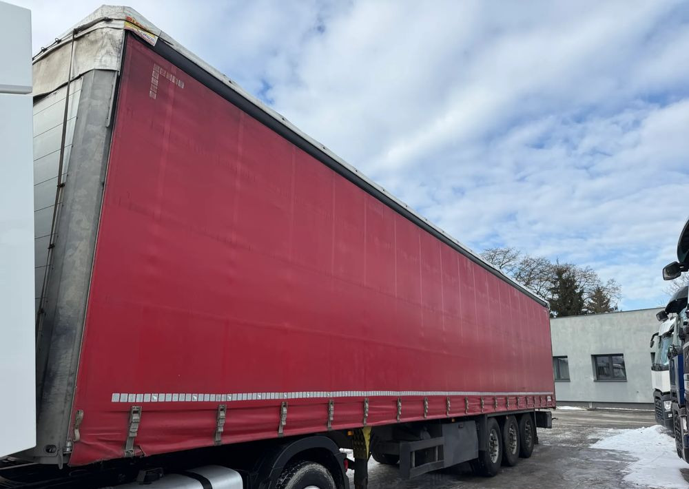 Schmitz Cargobull SCB OSIE SCHMITZ PODNOSZONA OŚ - Тентованный полуприцеп: фото 2 Schmitz Cargobull SCB OSIE SCHMITZ PODNOSZONA OŚ - Тентованный полуприцеп: фото 2