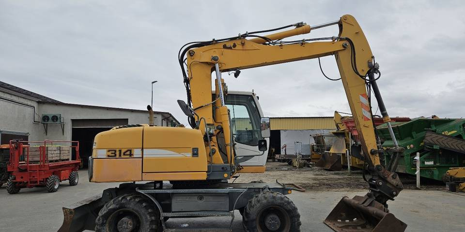 Koparka kołowa Liebherr A314 Litronic 9350 h 4 łyżki kołówka - Колёсный экскаватор: фото 5 Koparka kołowa Liebherr A314 Litronic 9350 h 4 łyżki kołówka - Колёсный экскаватор: фото 5