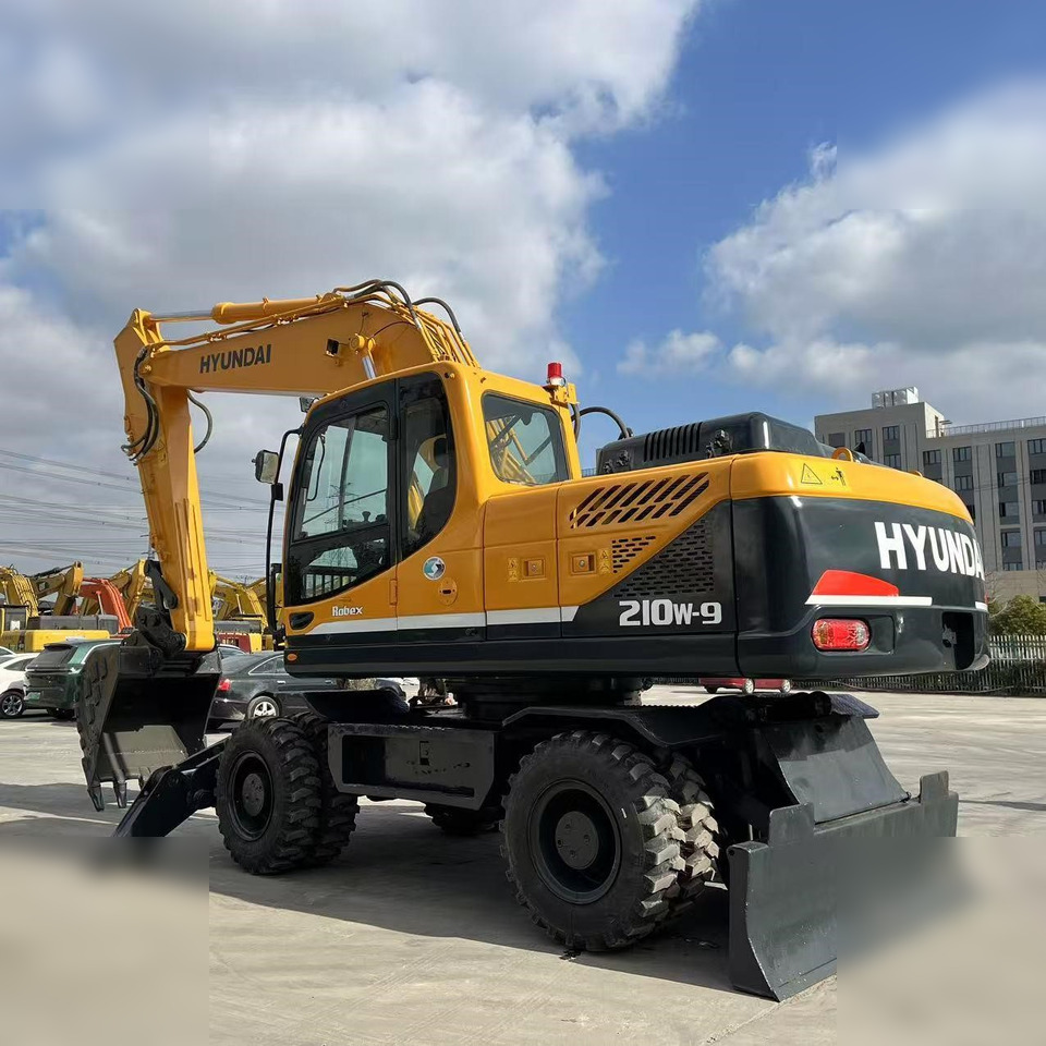 HYUNDAI ROBEX 210W-9 - Колёсный экскаватор: фото 1 HYUNDAI ROBEX 210W-9 - Колёсный экскаватор: фото 1