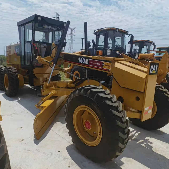 Used Japan Imported Caterpillar 140M Cat 140m Motor Grader with Good Quality and Low Price for Sale - Экскаватор: фото 1 Used Japan Imported Caterpillar 140M Cat 140m Motor Grader with Good Quality and Low Price for Sale - Экскаватор: фото 1