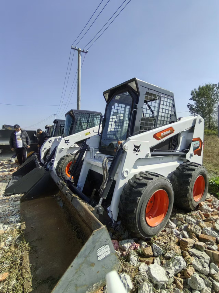 BOBCAT S590 - Мини-погрузчик с бортовым поворотом: фото 1 BOBCAT S590 - Мини-погрузчик с бортовым поворотом: фото 1