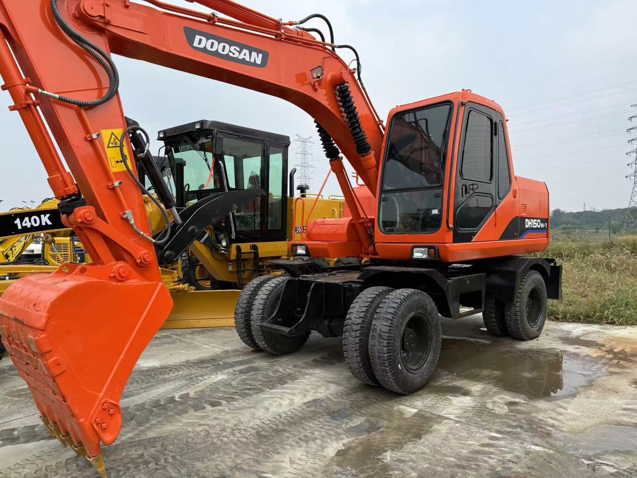 DOOSAN DH150W-7 - Колёсный экскаватор: фото 1 DOOSAN DH150W-7 - Колёсный экскаватор: фото 1