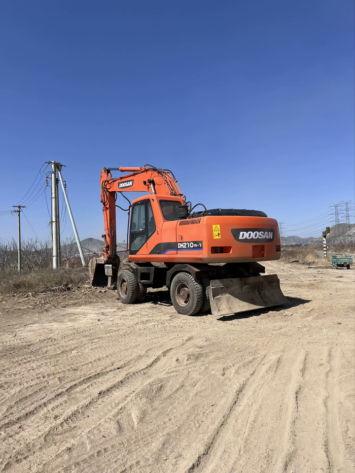 DOOSAN DH210W-7 - Колёсный экскаватор: фото 5 DOOSAN DH210W-7 - Колёсный экскаватор: фото 5