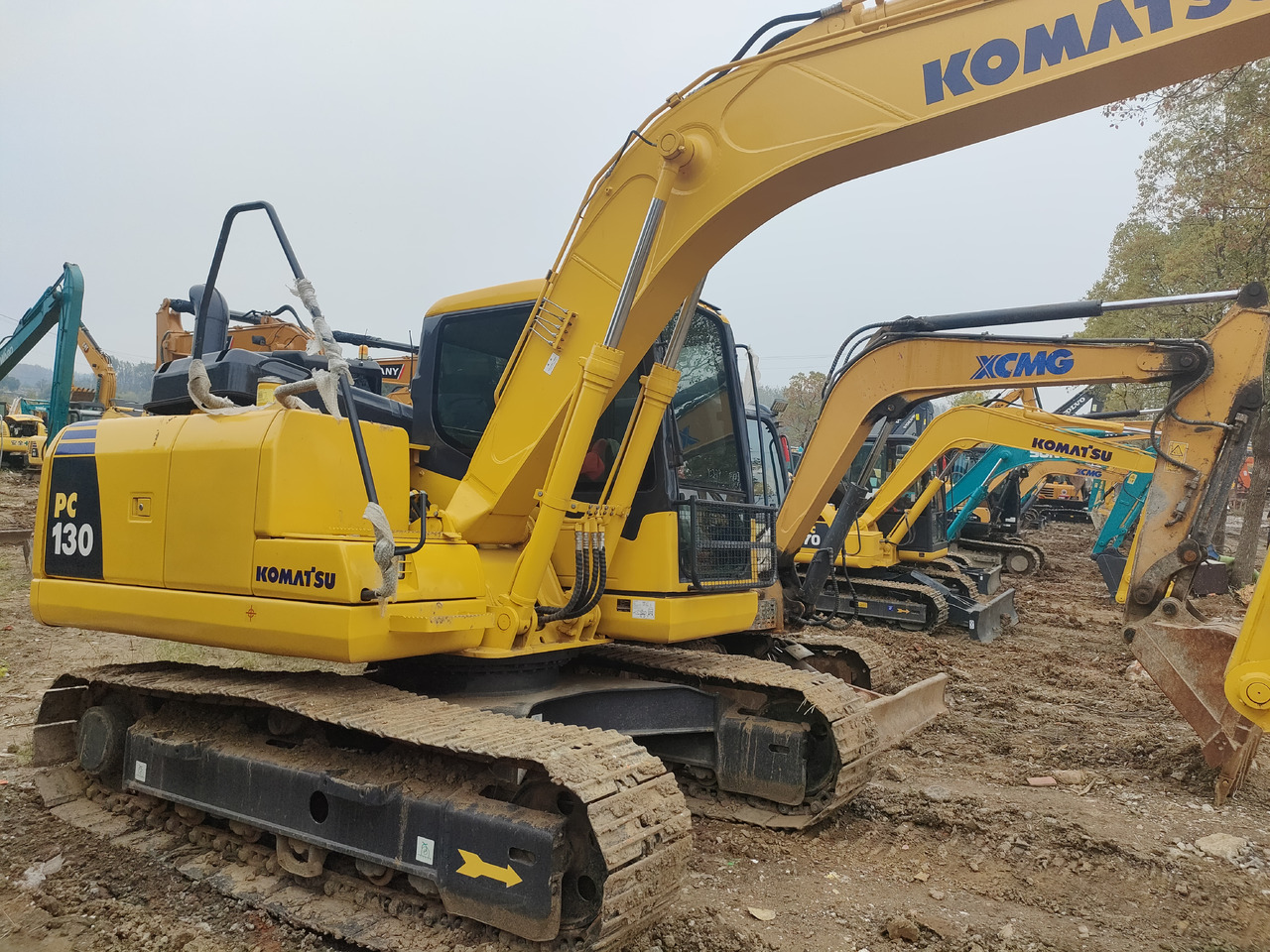 KOMATSU PC130-7 - Колёсный экскаватор: фото 2 KOMATSU PC130-7 - Колёсный экскаватор: фото 2