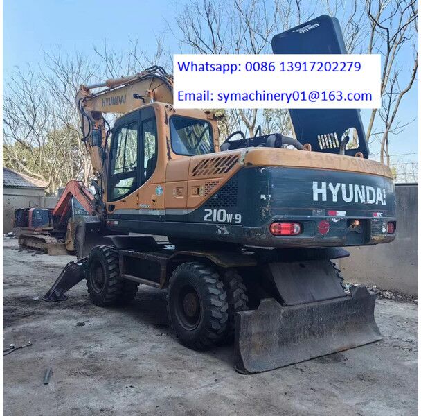 Hyundai R210W - Колёсный экскаватор: фото 1 Hyundai R210W - Колёсный экскаватор: фото 1