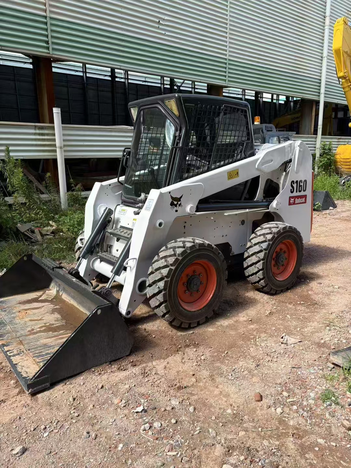 BOBCAT S180 - Мини-погрузчик с бортовым поворотом: фото 5 BOBCAT S180 - Мини-погрузчик с бортовым поворотом: фото 5