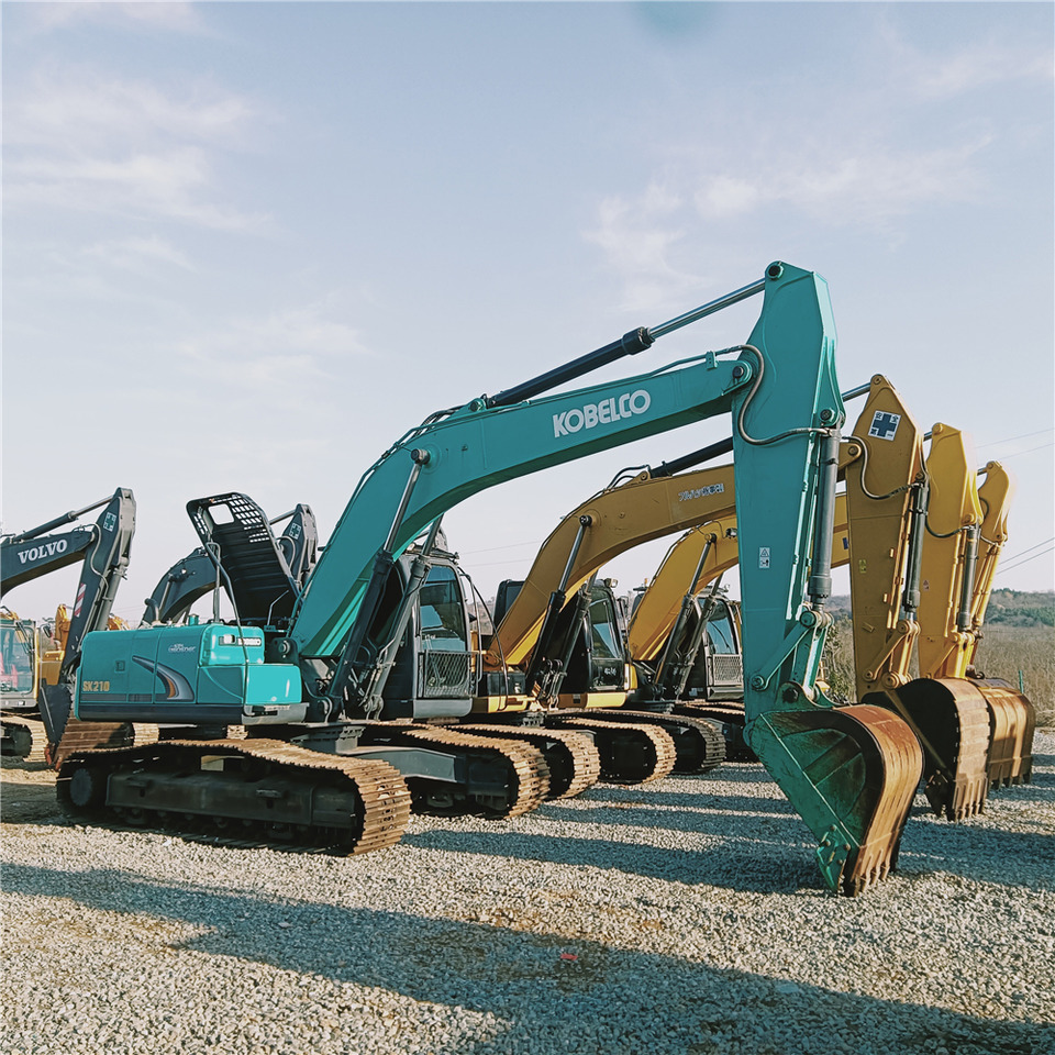 KOBELCO SK210 - Гусеничный экскаватор: фото 2 KOBELCO SK210 - Гусеничный экскаватор: фото 2