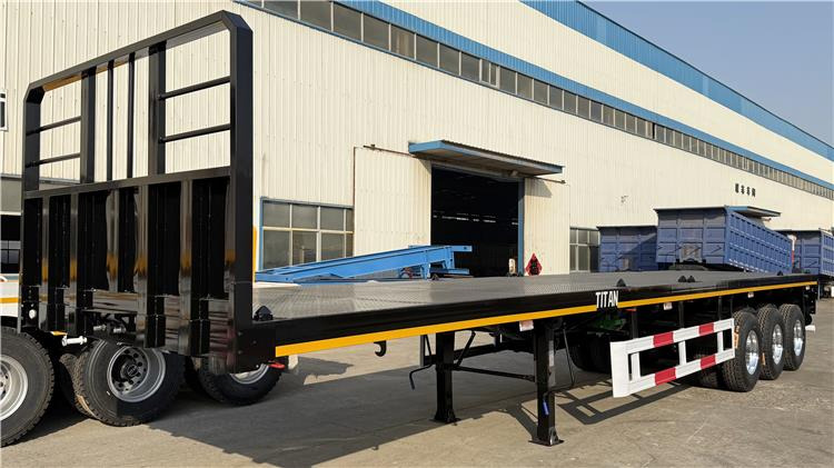 TITAN 12.5M 3 Axle Flat Deck Trailer for Sale In Tanzania - Полуприцеп-контейнеровоз/ Сменный кузов: фото 2 TITAN 12.5M 3 Axle Flat Deck Trailer for Sale In Tanzania - Полуприцеп-контейнеровоз/ Сменный кузов: фото 2