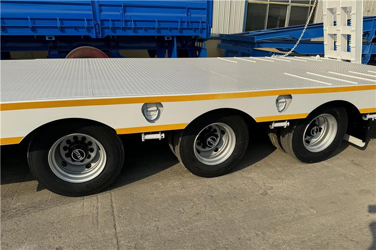 TITAN 3 Axle 80 Ton Lowbed Semi Trailer for Sale In Philippines - Низкорамный полуприцеп: фото 5 TITAN 3 Axle 80 Ton Lowbed Semi Trailer for Sale In Philippines - Низкорамный полуприцеп: фото 5