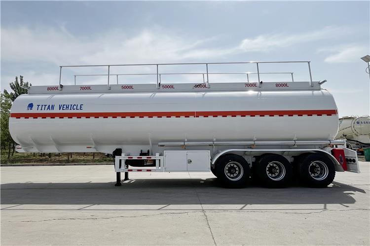 TITAN 3 Axle Fuel Tanker Trailer with 40000 Liters Capacity for Sale In Nigeria - Полуприцеп-цистерна: фото 1 TITAN 3 Axle Fuel Tanker Trailer with 40000 Liters Capacity for Sale In Nigeria - Полуприцеп-цистерна: фото 1