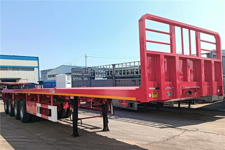TITAN 4 Axle Shipping Container Flatbed Trailer For Sale In Lagos - Полуприцеп-контейнеровоз/ Сменный кузов: фото 2 TITAN 4 Axle Shipping Container Flatbed Trailer For Sale In Lagos - Полуприцеп-контейнеровоз/ Сменный кузов: фото 2