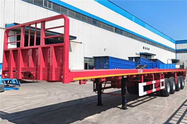 TITAN 4 Axle Shipping Container Flatbed Trailer For Sale In Lagos - Полуприцеп-контейнеровоз/ Сменный кузов: фото 1 TITAN 4 Axle Shipping Container Flatbed Trailer For Sale In Lagos - Полуприцеп-контейнеровоз/ Сменный кузов: фото 1