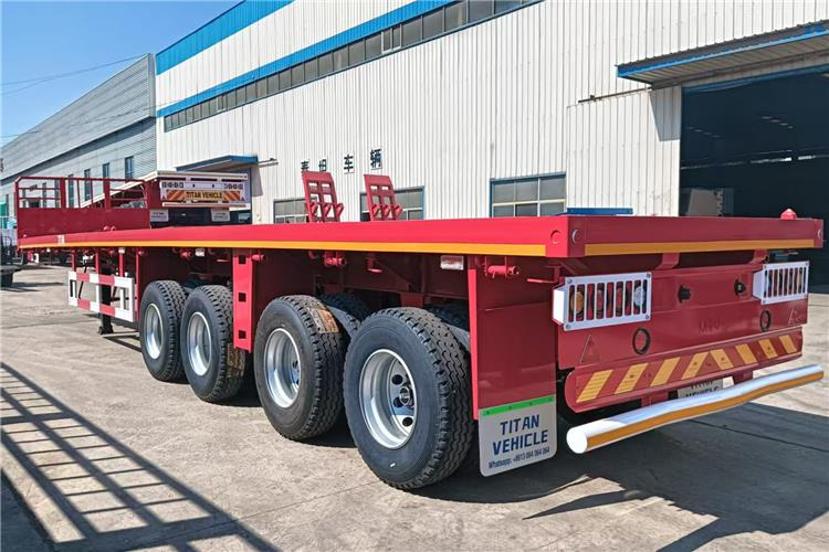 TITAN 4 Axle Shipping Container Flatbed Trailer For Sale In Lagos - Полуприцеп-контейнеровоз/ Сменный кузов: фото 3 TITAN 4 Axle Shipping Container Flatbed Trailer For Sale In Lagos - Полуприцеп-контейнеровоз/ Сменный кузов: фото 3