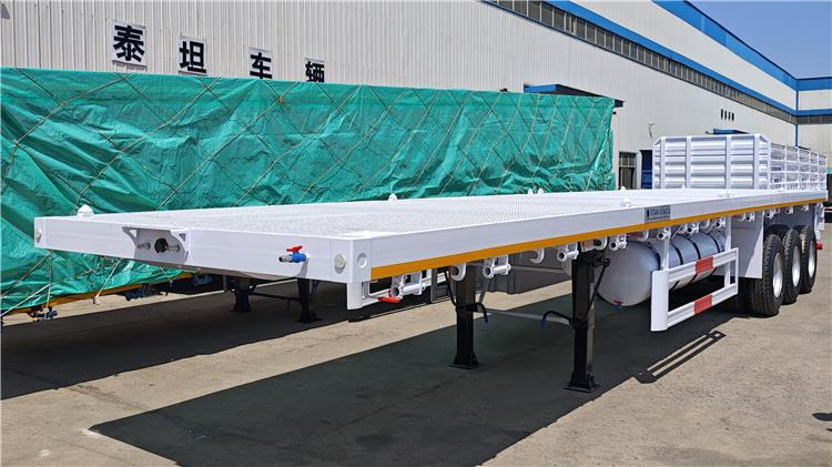 TITAN 40ft Tri Axle Flatbed Semi Trailer for Sale Price In Nigeria Lagos - Полуприцеп-контейнеровоз/ Сменный кузов: фото 2 TITAN 40ft Tri Axle Flatbed Semi Trailer for Sale Price In Nigeria Lagos - Полуприцеп-контейнеровоз/ Сменный кузов: фото 2