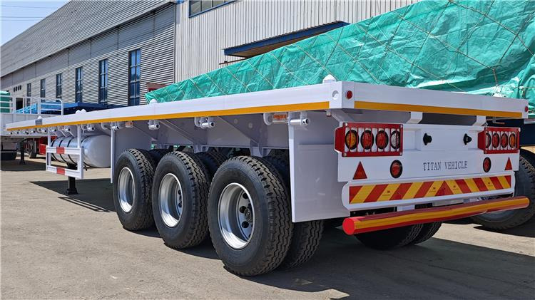 TITAN 40ft Tri Axle Flatbed Semi Trailer for Sale Price In Nigeria Lagos - Полуприцеп-контейнеровоз/ Сменный кузов: фото 3 TITAN 40ft Tri Axle Flatbed Semi Trailer for Sale Price In Nigeria Lagos - Полуприцеп-контейнеровоз/ Сменный кузов: фото 3