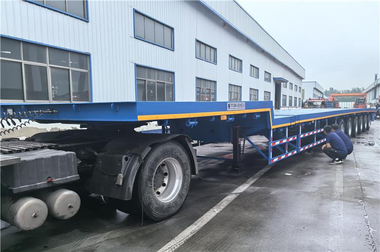 TITAN 6 Axle 54m Telescopic Flatbed Trailer for Sale In Angola - Полуприцеп бортовой/ Платформа: фото 1 TITAN 6 Axle 54m Telescopic Flatbed Trailer for Sale In Angola - Полуприцеп бортовой/ Платформа: фото 1