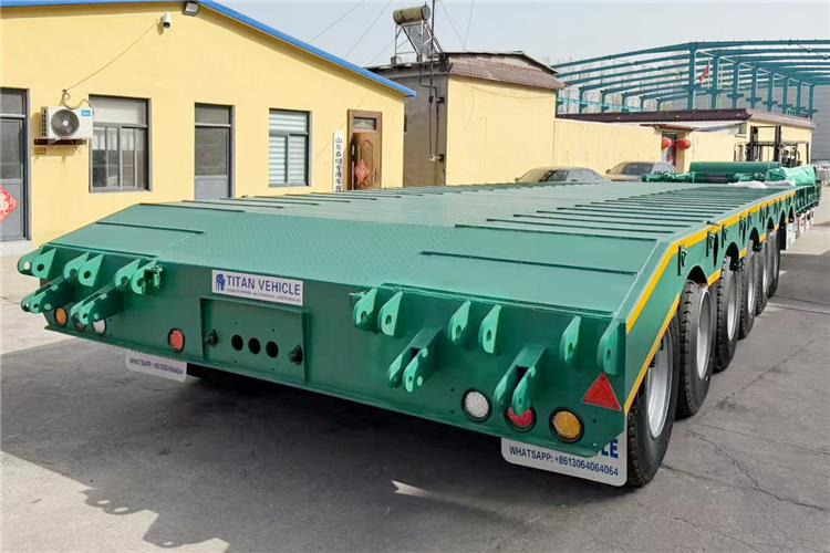 TITAN 6 Axle 80 Ton Low Loader Semi Trailer for Sale In Zambia - Низкорамный полуприцеп: фото 3 TITAN 6 Axle 80 Ton Low Loader Semi Trailer for Sale In Zambia - Низкорамный полуприцеп: фото 3