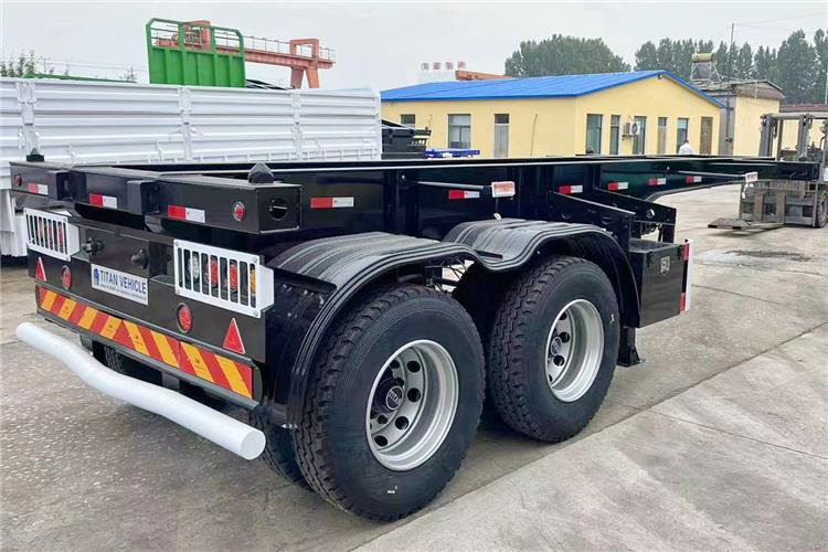 TITAN In Stock 20 ft Shipping Container Trailer for Sale In Ghana - Полуприцеп-контейнеровоз/ Сменный кузов: фото 3 TITAN In Stock 20 ft Shipping Container Trailer for Sale In Ghana - Полуприцеп-контейнеровоз/ Сменный кузов: фото 3