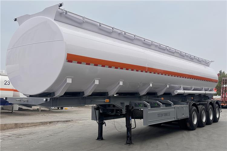 TITAN In Stock 4 Axle Petrol Tanker Trailer for Sale In Jamaica - Полуприцеп-цистерна: фото 1 TITAN In Stock 4 Axle Petrol Tanker Trailer for Sale In Jamaica - Полуприцеп-цистерна: фото 1