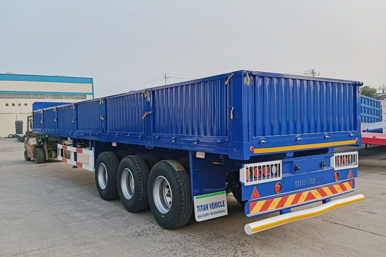 TITAN Tri Axle Dropside Trailer For Sale In Nigeria Lagos - Полуприцеп бортовой/ Платформа: фото 3 TITAN Tri Axle Dropside Trailer For Sale In Nigeria Lagos - Полуприцеп бортовой/ Платформа: фото 3