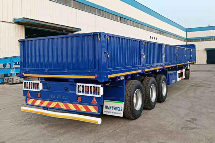 TITAN Tri Axle Dropside Trailer For Sale In Nigeria Lagos - Полуприцеп бортовой/ Платформа: фото 1 TITAN Tri Axle Dropside Trailer For Sale In Nigeria Lagos - Полуприцеп бортовой/ Платформа: фото 1