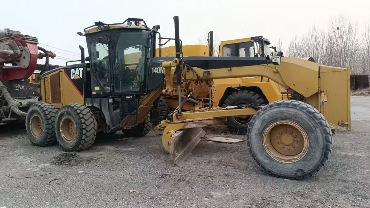 CATERPILLAR 140M - Грейдер: фото 1 CATERPILLAR 140M - Грейдер: фото 1