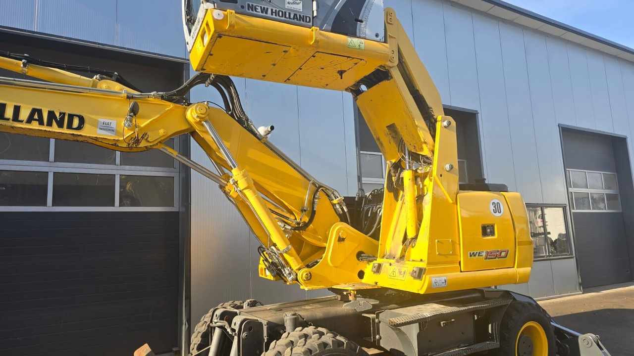 New Holland WE 150C - Колёсный экскаватор: фото 1 New Holland WE 150C - Колёсный экскаватор: фото 1