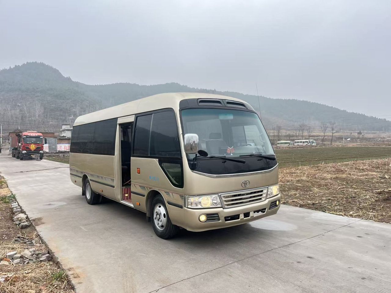 TOYOTA COASTER - Микроавтобус, Пассажирский фургон: фото 1 TOYOTA COASTER - Микроавтобус, Пассажирский фургон: фото 1