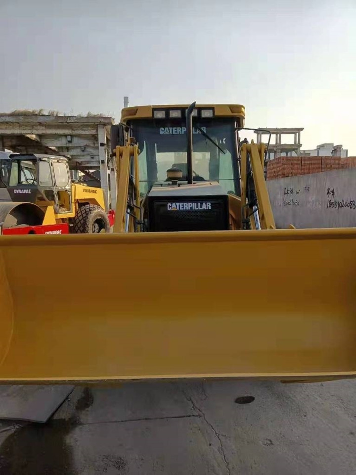 CAT 416E - Экскаватор-погрузчик: фото 3 CAT 416E - Экскаватор-погрузчик: фото 3