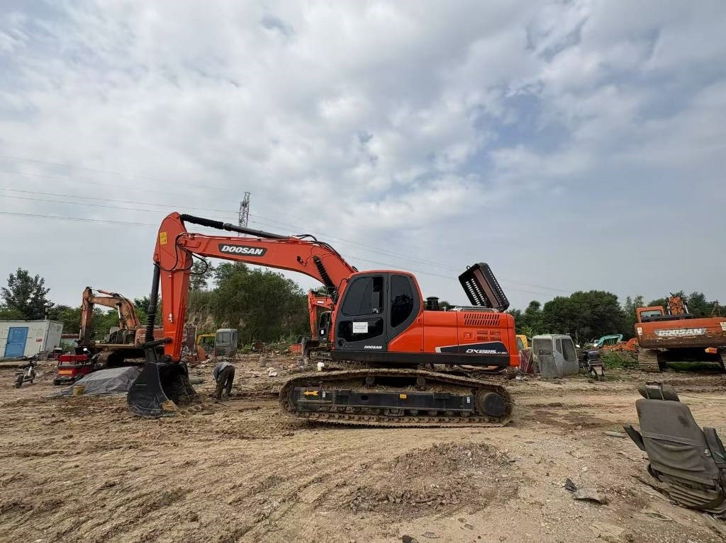 Doosan DX225LC-9C - Гусеничный экскаватор: фото 1 Doosan DX225LC-9C - Гусеничный экскаватор: фото 1