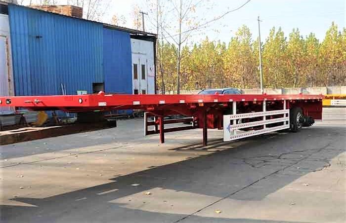 Tri-axle Flatbed Container Trailer - Полуприцеп бортовой/ Платформа: фото 3 Tri-axle Flatbed Container Trailer - Полуприцеп бортовой/ Платформа: фото 3
