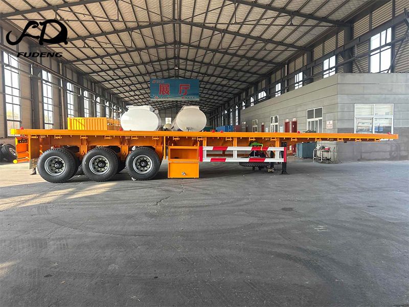 FUDENG 45FT Flatbed Container Trailer with High Strength Steel Frame for Long Distance Cargo Transport - Полуприцеп бортовой/ Платформа: фото 3 FUDENG 45FT Flatbed Container Trailer with High Strength Steel Frame for Long Distance Cargo Transport - Полуприцеп бортовой/ Платформа: фото 3