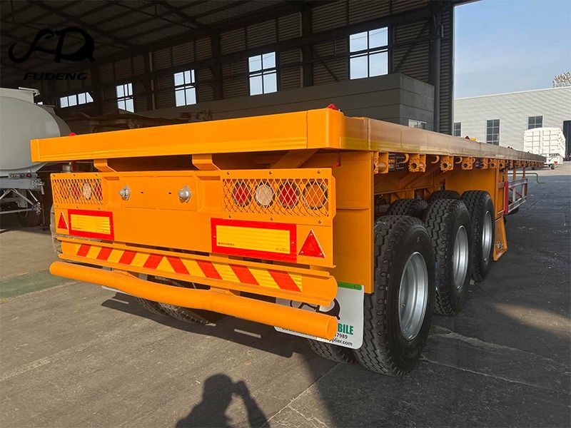 FUDENG 45FT Flatbed Container Trailer with High Strength Steel Frame for Long Distance Cargo Transport - Полуприцеп бортовой/ Платформа: фото 5 FUDENG 45FT Flatbed Container Trailer with High Strength Steel Frame for Long Distance Cargo Transport - Полуприцеп бортовой/ Платформа: фото 5