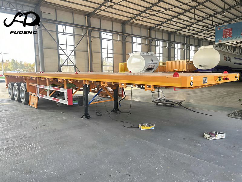 FUDENG 45FT Flatbed Container Trailer with High Strength Steel Frame for Long Distance Cargo Transport - Полуприцеп бортовой/ Платформа: фото 1 FUDENG 45FT Flatbed Container Trailer with High Strength Steel Frame for Long Distance Cargo Transport - Полуприцеп бортовой/ Платформа: фото 1