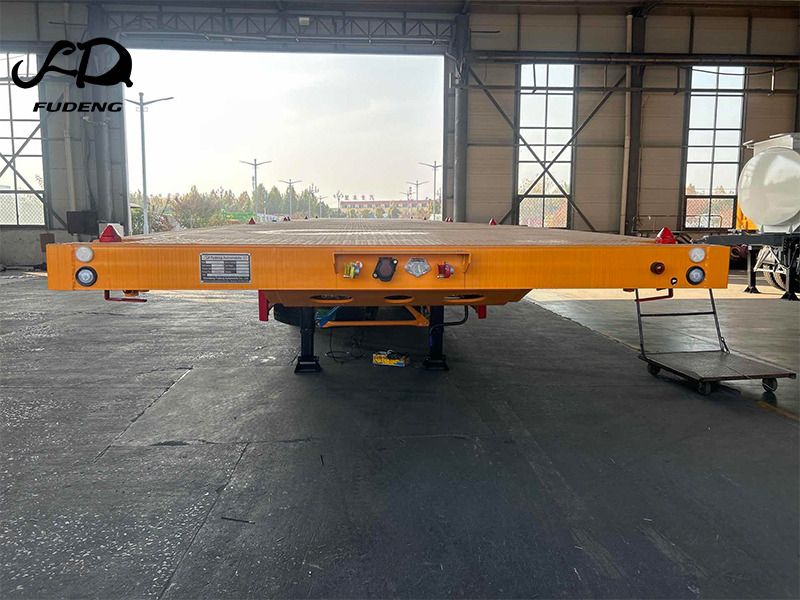 FUDENG 45FT Flatbed Container Trailer with High Strength Steel Frame for Long Distance Cargo Transport - Полуприцеп бортовой/ Платформа: фото 4 FUDENG 45FT Flatbed Container Trailer with High Strength Steel Frame for Long Distance Cargo Transport - Полуприцеп бортовой/ Платформа: фото 4