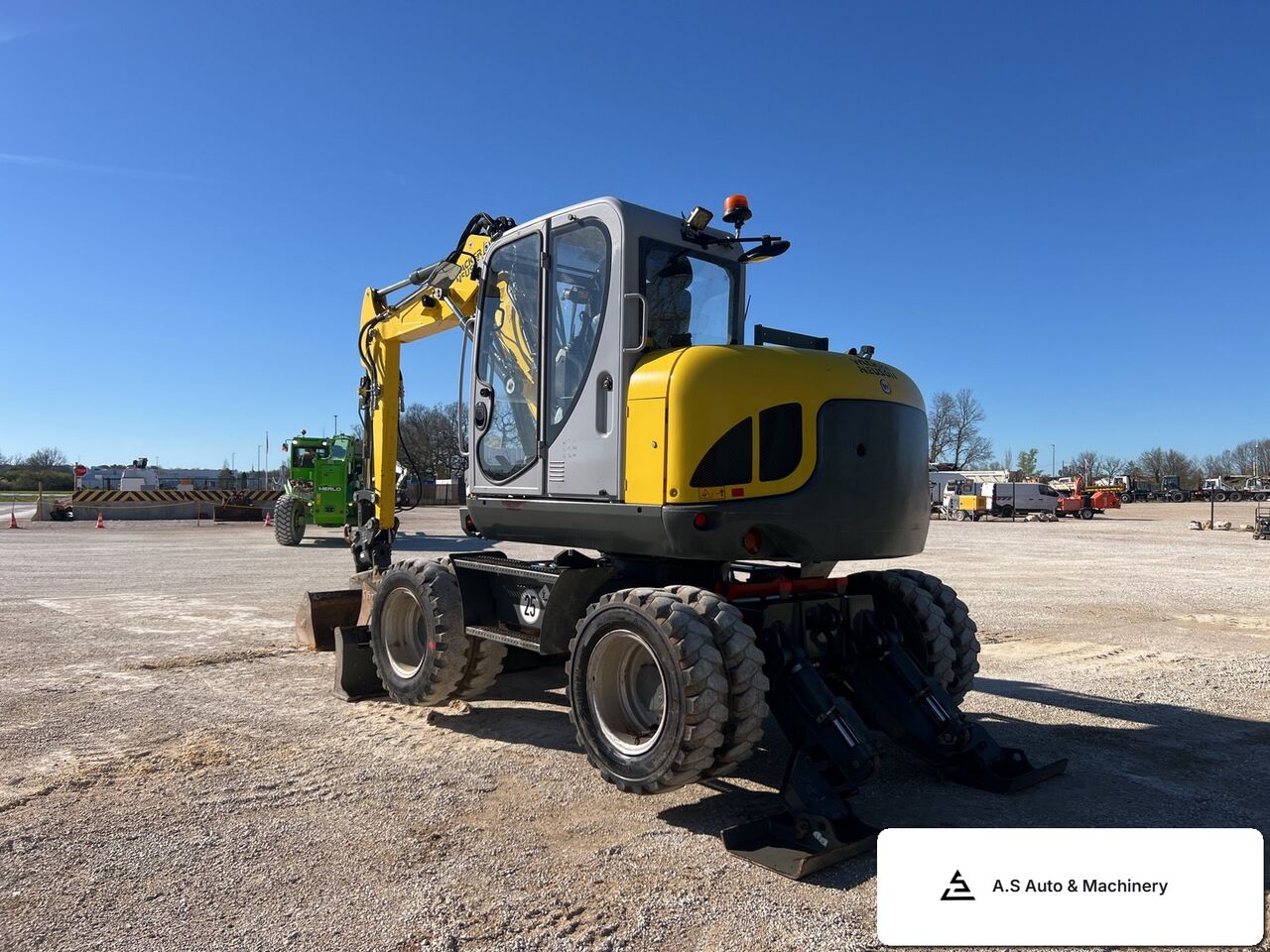 Wacker Neuson EW100 - Колёсный экскаватор: фото 3 Wacker Neuson EW100 - Колёсный экскаватор: фото 3