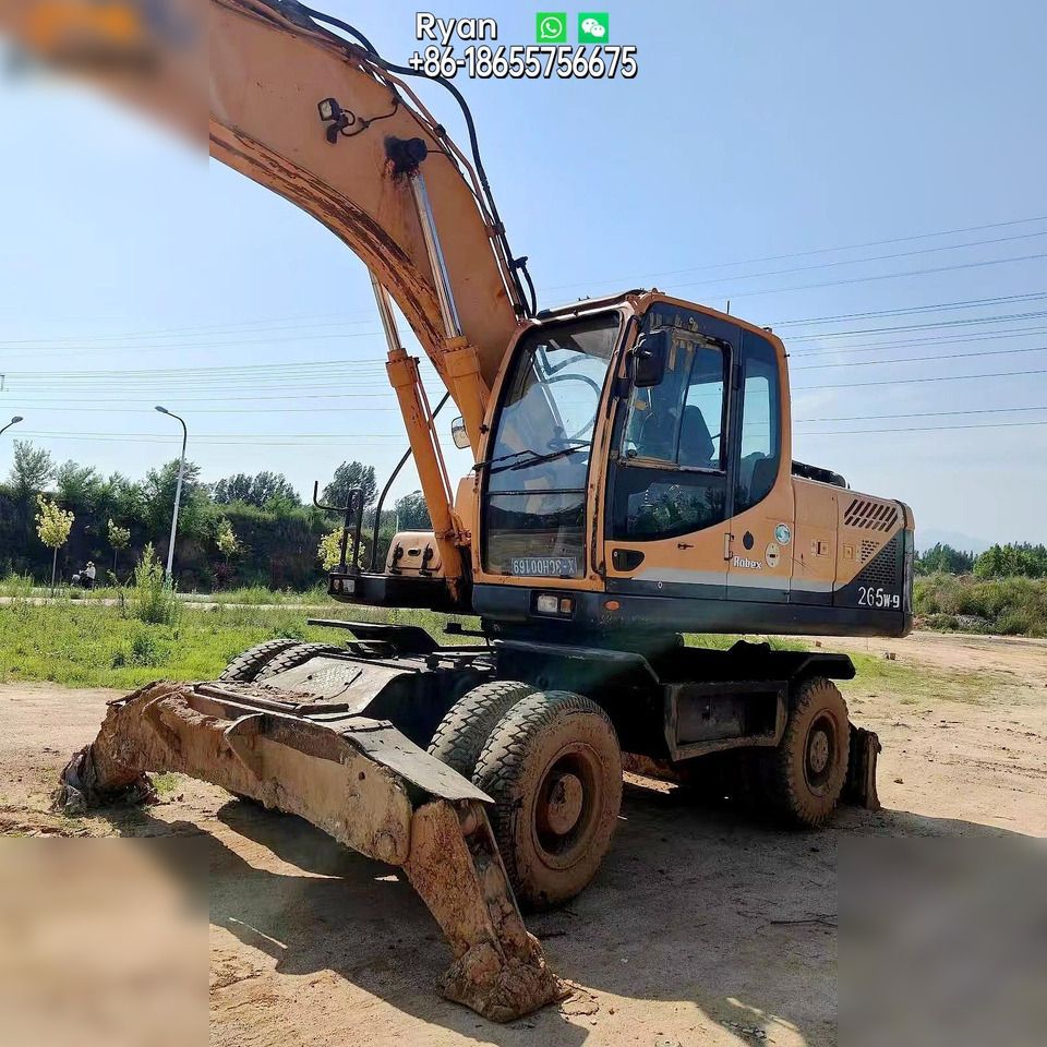 HYUNDAI ROBEX 210W-9 - Колёсный экскаватор: фото 1 HYUNDAI ROBEX 210W-9 - Колёсный экскаватор: фото 1