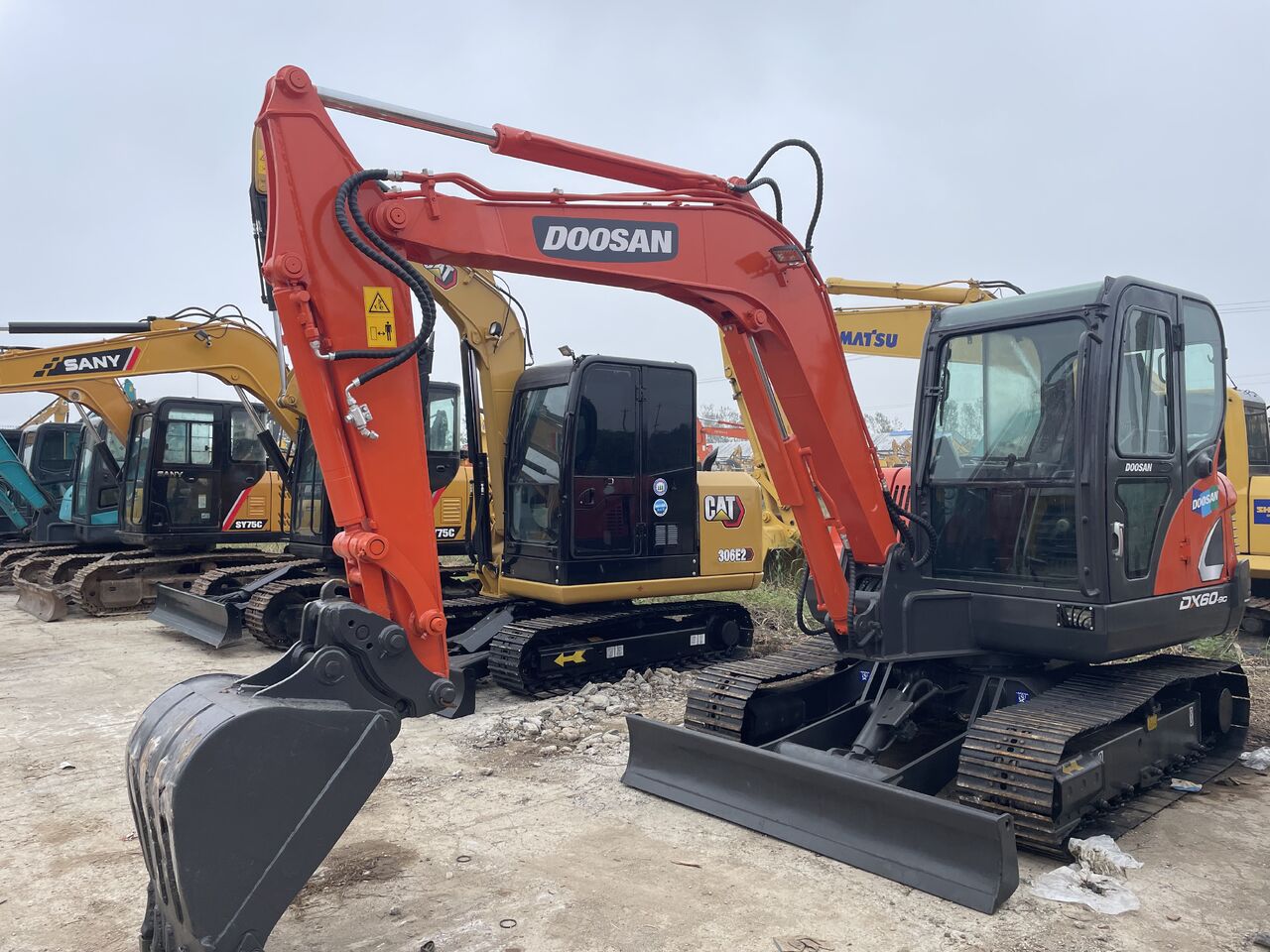 DOOSAN DX60 - Мини-экскаватор: фото 1 DOOSAN DX60 - Мини-экскаватор: фото 1