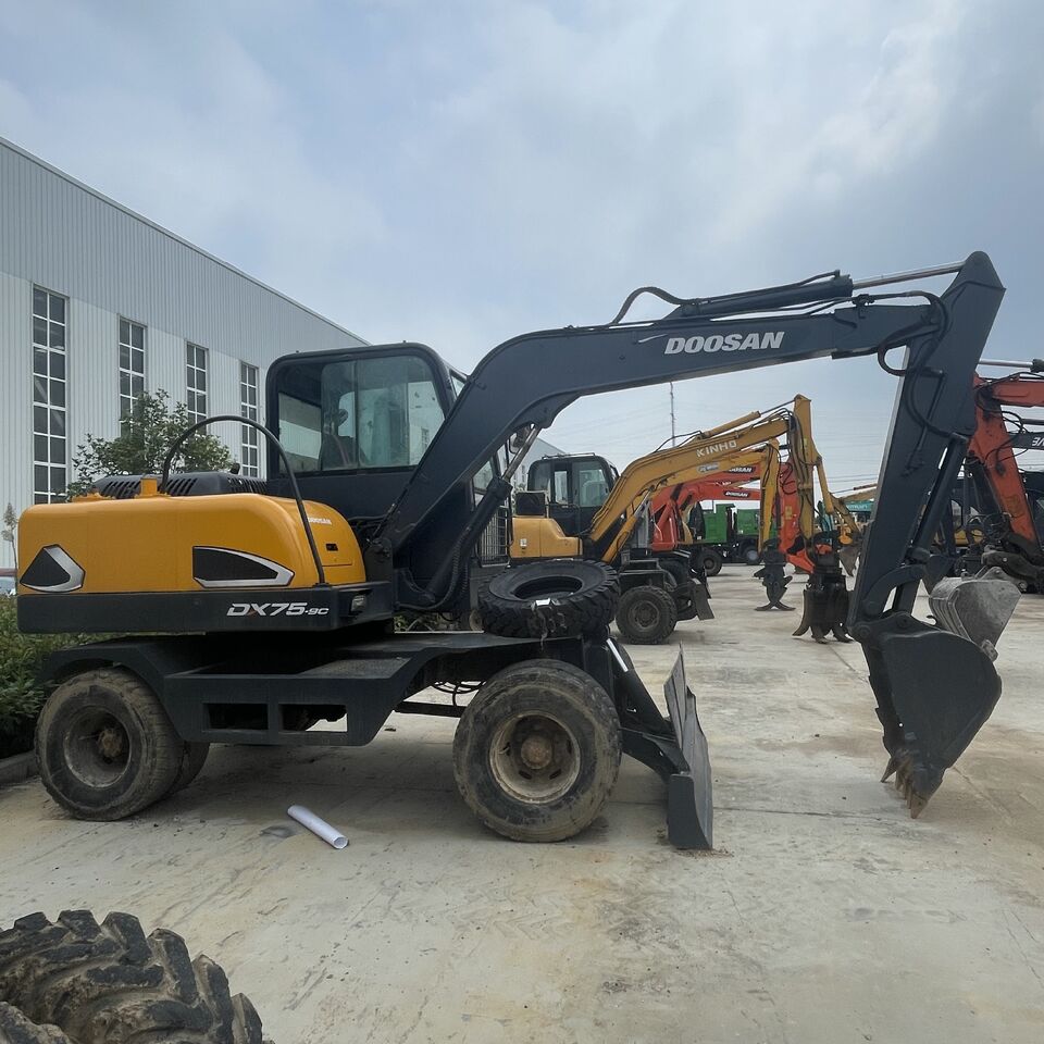 DOOSAN DX75 - Колёсный экскаватор: фото 2 DOOSAN DX75 - Колёсный экскаватор: фото 2