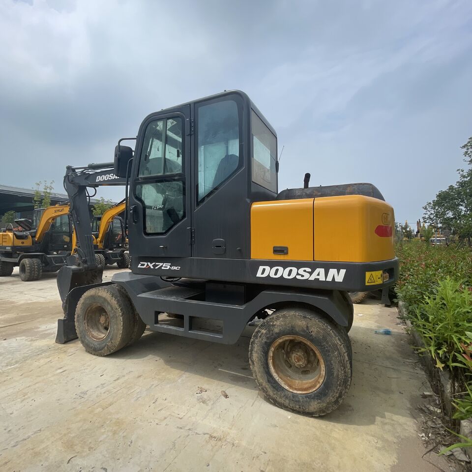 DOOSAN DX75 - Колёсный экскаватор: фото 5 DOOSAN DX75 - Колёсный экскаватор: фото 5