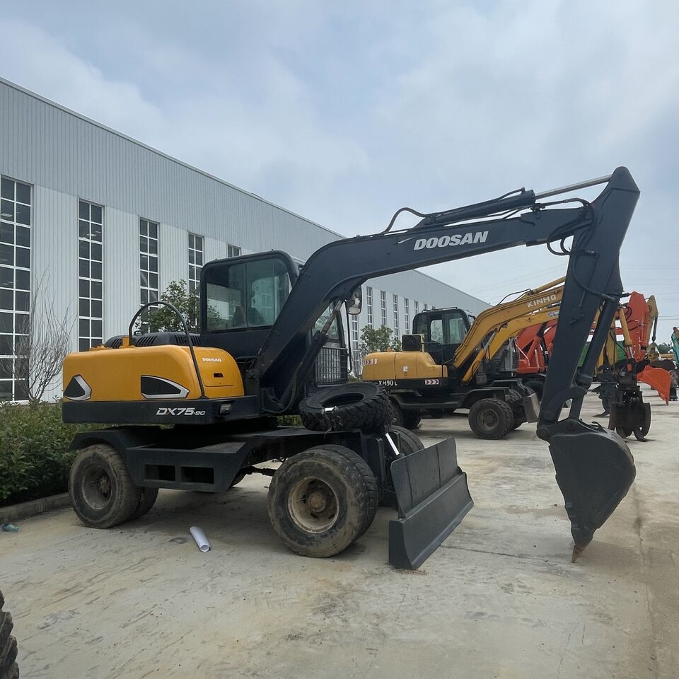 DOOSAN DX75 - Колёсный экскаватор: фото 1 DOOSAN DX75 - Колёсный экскаватор: фото 1